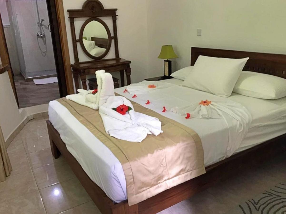 Acquario Guesthouse Anse Volbert Village Kültér fotó