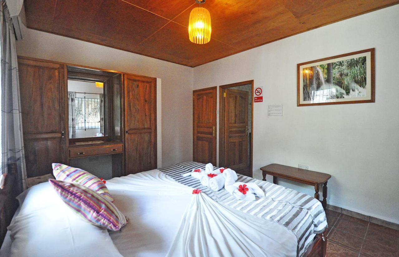 Acquario Guesthouse Anse Volbert Village Kültér fotó